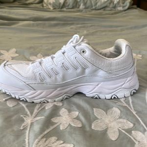 All white Avis shoes